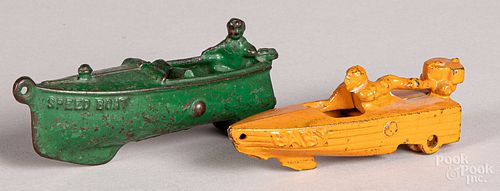 Two Hubley cast iron boats