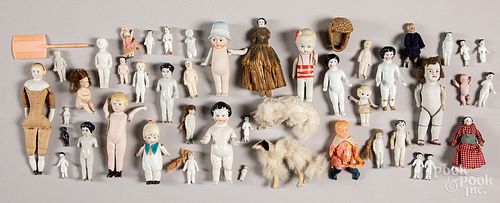Large group of small bisque dolls