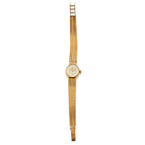 Ticin - A 18K yellow gold lady's wristwatch, Ticin
