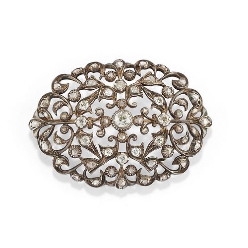 A silver, 18K yellow gold and diamond brooch, early 20th Century