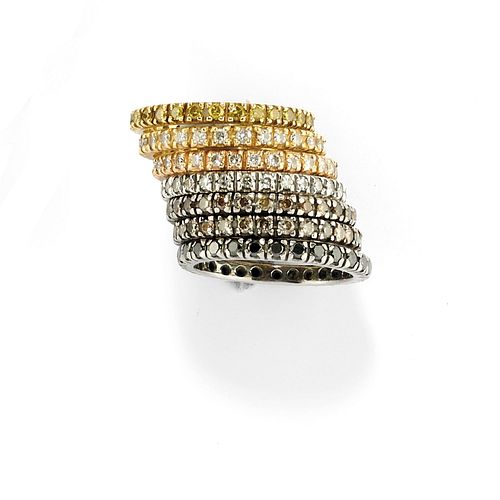 Seven 18K two-color gold and diamond rings, defects