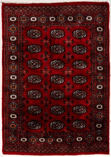 A LATE 20TH CENTURY HAND KNOTTED BOKHARA RUG