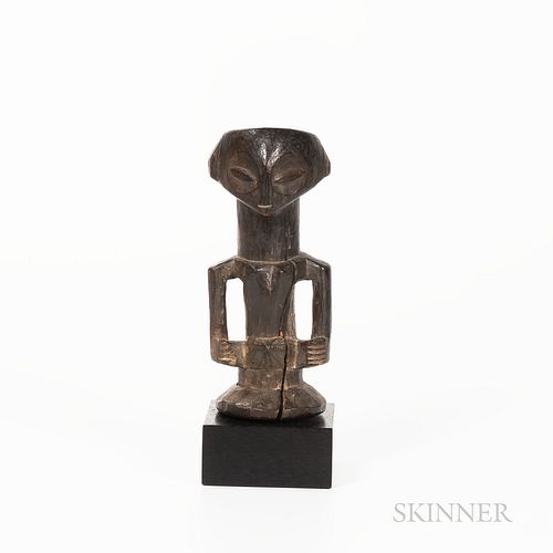 Kusu Power Figure, Democratic Republic of the Congo, female figure with hands at sides, long narrow cutout arms and elongated torso, th