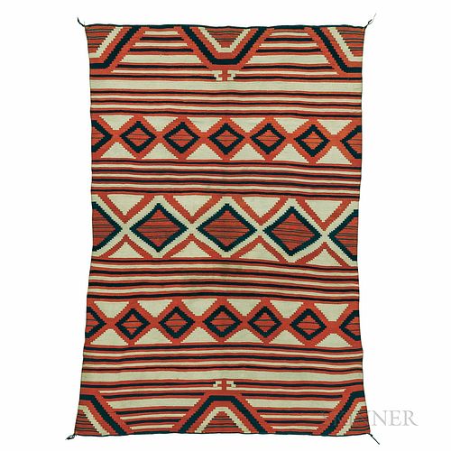 Navajo Classic Serape, c. 1860s, tightly woven with natural indigo and cochineal dyes, probably a combination of 3-ply Saxony and hands
