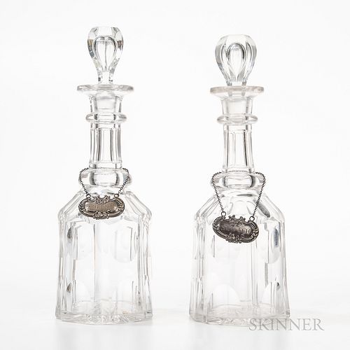 Pair of Colorless Glass Decanters, Two Sterling Silver Liquor Tags, and Silverplate Bar Tools.