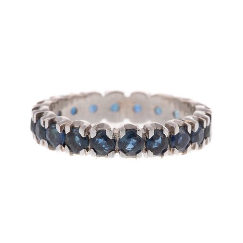 A Sapphire Eternity Band in 14K