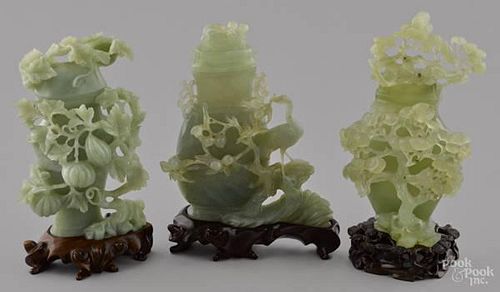 Three Chinese carved pale green jade lidded urns