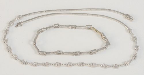 Two Piece 18 Karat White Gold Necklace
set with diamonds in squares, along with close matching 18 karat white gold and diamond bracelet
length 6 1/2 i