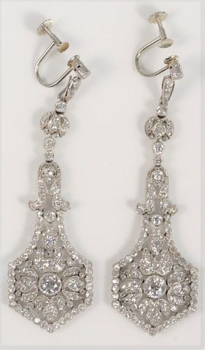 Platinum Diamond Earrings
Edwardian period pendeloque style day/night earrings
each measuring 2 1/2 inches long, earrings are non-pierced French back,