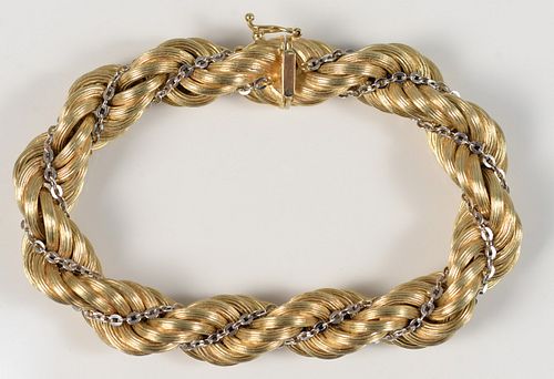 14 Karat Gold Bracelet twist design, with small white gold chain woven in length 7 3/4 inches 32.6 grams