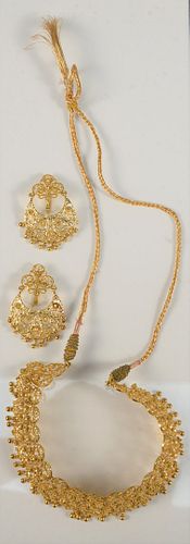 Three Piece 22 Karat Gold Necklace and Earrings Set
125 grams (without string)