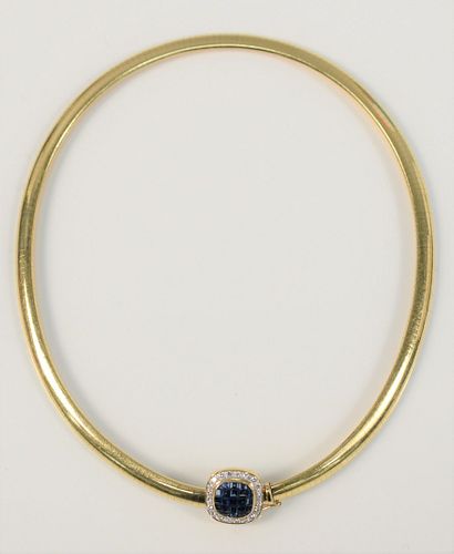 Omega 18 Karat Gold Necklace
having slide set with blue sapphires, surrounded by diamonds
47.1 grams