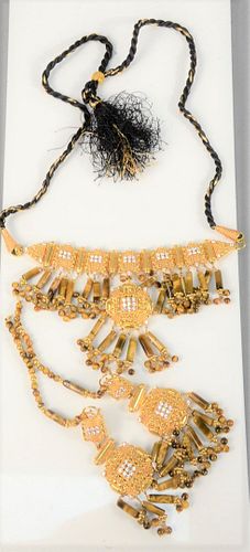 22 Karat Gold Necklace and Earrings 
set with stones, and tiger eye drops
125 grams total weight (without string necklace)