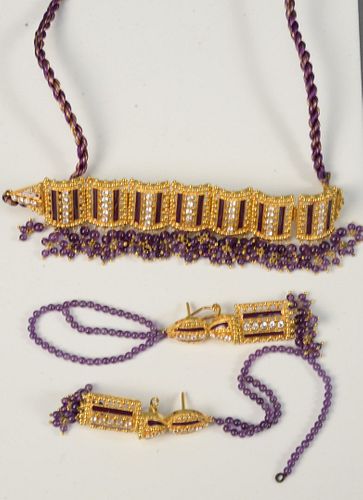 Three Piece 22 Karat Gold Necklace and Earrings
set with amethyst
79 grams total weight (without string)