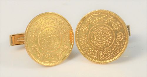 Pair of 14 Karat Gold Cufflinks
mounted with Middle Eastern gold coins
diameter 21.6 millimeters
20.7 grams