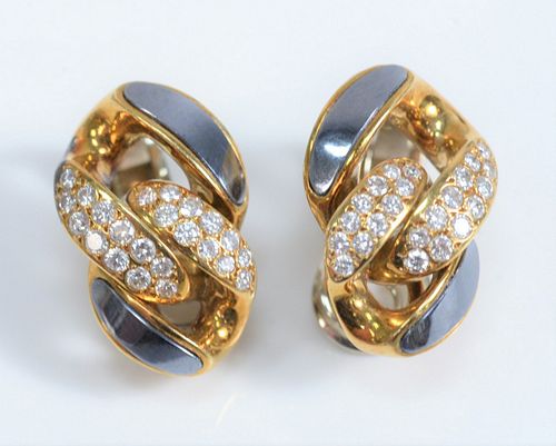 Pair of 18 Karat White and Yellow Gold Earrings
set with 23 diamonds in each
16.9 grams
