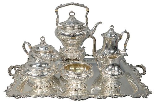 Seven Piece Gorham Sterling Silver Tea and Coffee Set
having tilting pot, coffee pot, teapot, sugar, creamer, waste bowl, and large two handled tray (