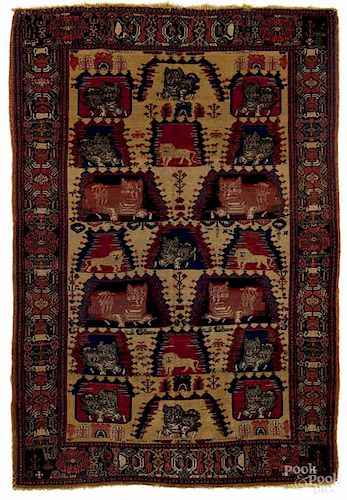 Senna carpet, ca. 1900, with lion and animal de