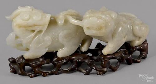 Chinese carved white jade foo lion group, 2 3/8