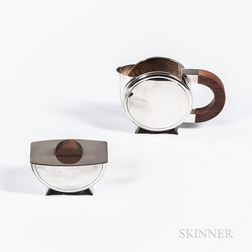 Christofle Art Deco Sugar and Creamer, France, 20th century, circular form with rosewood handles, creamer ht. 4 1/4, sugar ht. 2 3/4 in