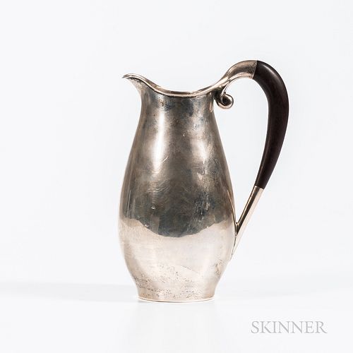 Sterling Silver Pitcher, Mexico, c. 1955, ovoid form with wood loop handle, maker's mark "MA, sterling, eagle mark, 925, Mexico," ht. 9
