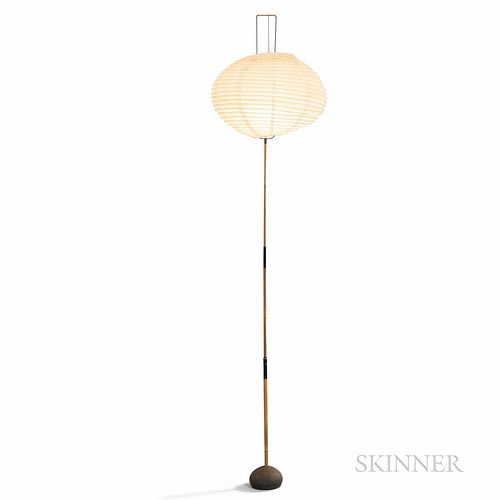 Isamu Noguchi (American, 1904-1988) for Akari Bamboo Floor Lamp, Japan, c. 1950, bamboo standard set on iron base, paper shade, marked