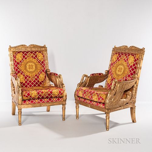 Pair of Versace Swan Throne Chairs, late 20th century, ornate giltwood frame with swan-decorated arms, in original red and gold upholst