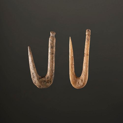 A Pair of Bone Fish Hooks, Largest 1 in.