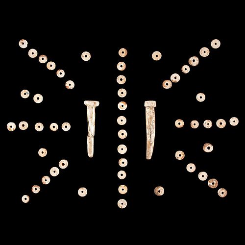 A Frame of Shell Disc Beads and Ornaments, Largest 3-1/4 in.