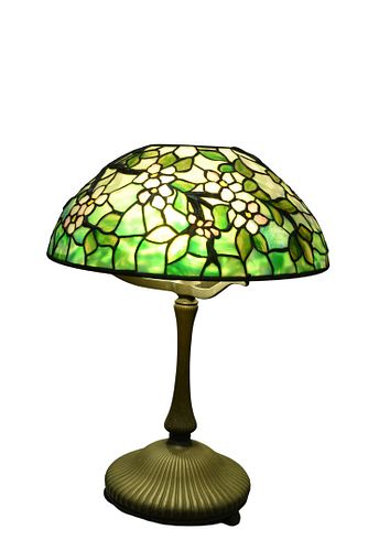 Tiffany Studios Apple Blossom Leaded Glass Table Lampshade having rare raised branches, flowers with pink petals, and yellow centerheight 21 1/2 inc