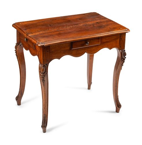 A Louis XV Walnut Four-Drawer Table