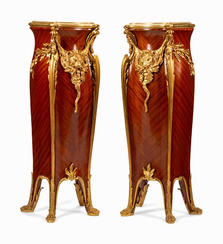 A Pair of Louis XV Style Gilt Bronze Mounted Mahogany Pedestals
