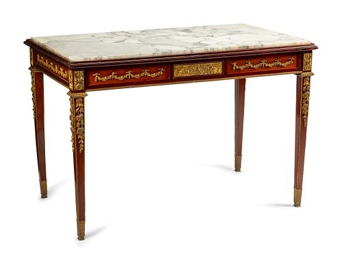 A Louis XVI Style Gilt Bronze Mounted Mahogany Marble-Top Center Table
