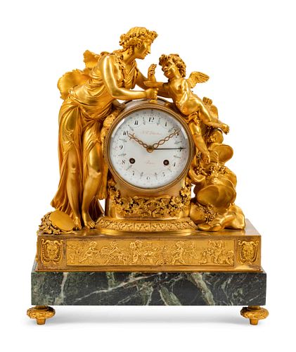 A French Gilt Bronze and Marble Mantel Clock