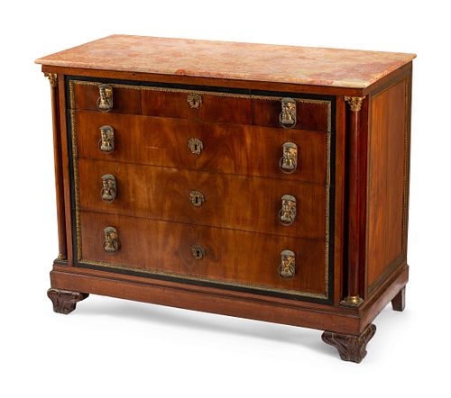 A Continental Egyptian Revival Gilt Metal Mounted Walnut Marble-Top Commode