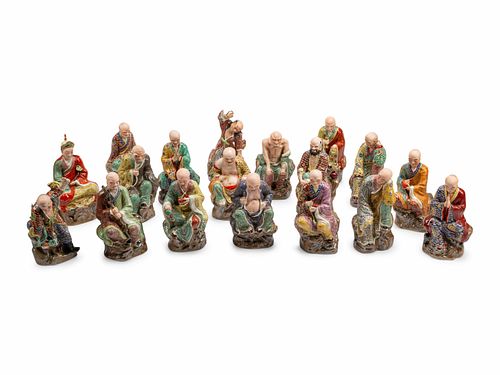 A Set of Eighteen Chinese Export Enameled Porcelain Figures of Immortals