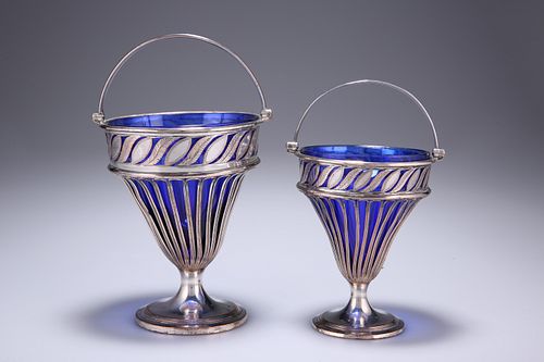 A GRADUATED PAIR OF OLD SHEFFIELD PLATED SWING-HANDLED BASK