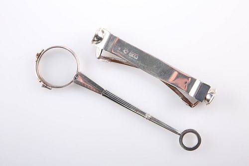 A LARGE EDWARDIAN SILVER DOUBLE-ENDED CIGAR CUTTER, by Gold