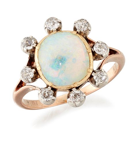AN OPAL AND DIAMOND CLUSTER RING, an oval opal in a cut-dow