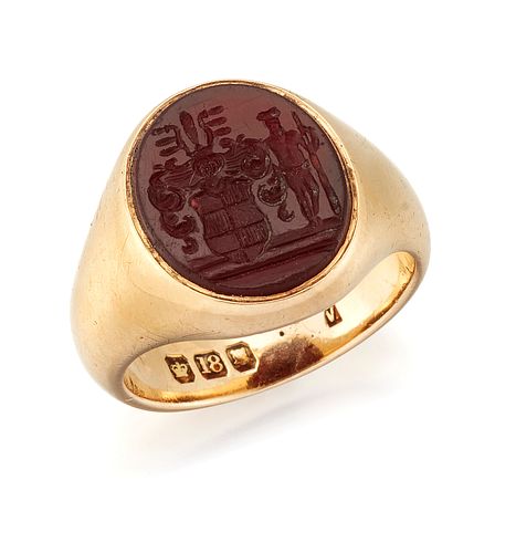 A SARDONYX INTAGLIO RING, the oval intaglio engraved with a