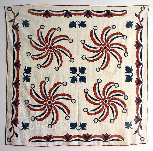 Red and Blue Pinwheel Quilt