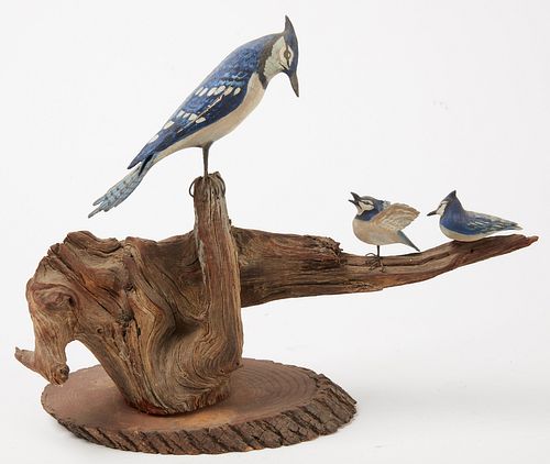 Carved Blue Jay with chicks Plus Singular Carving