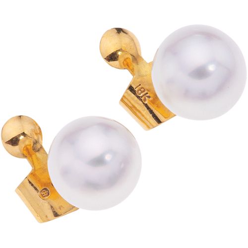 PAIR OF STUDS WITH CULTIVATED PEARLS IN 18K YELLOW GOLD Weight: 8.4 g. Diameter: 0.47" (1.2 cm) 2 Pearl ...