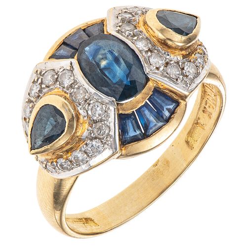 RING WITH SAPPHIRES AND DIAMONDS IN 18K YELLOW GOLD With 9 different cut sapphires ~ 1.70 ct and 28 brilliant cut diamonds ~ 0.56 ct