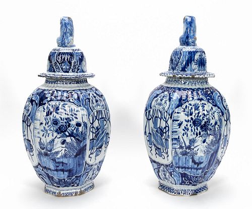 PAIR, DELFTWARE LIDDED URNS WITH LION FORM FINIALS