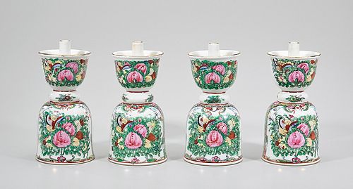 Group of Four Chinese Enameled Porcelain Candlesticks