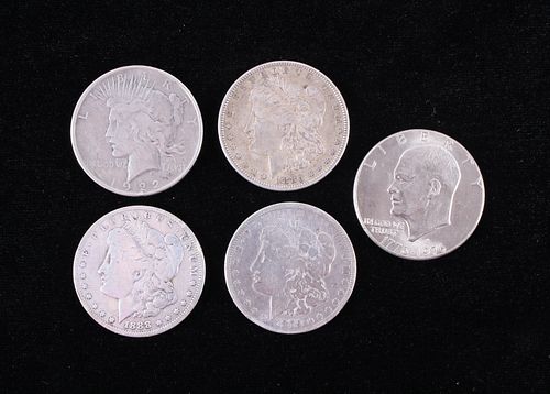 Four Morgan and One Eisenhower Silver Dollar Coins