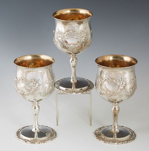 Set of Three Sterling Goblets, 20th c., by Reed and Barton, in the "Francis I" pattern, with repousse decoration and gilt washed interiors, each engra
