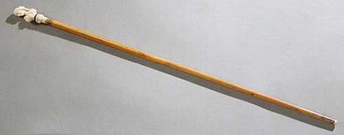 Carved Ivory and Maple Walking Stick, late 19th c., with a well carved ivory female bust handle, on a tapered cylindrical shaft. H.- 34 1/2 in., W.- 1