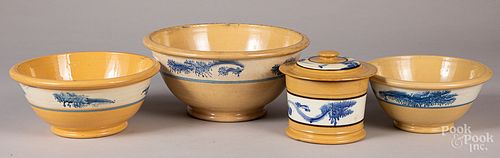 Three yellowware mixing bowls